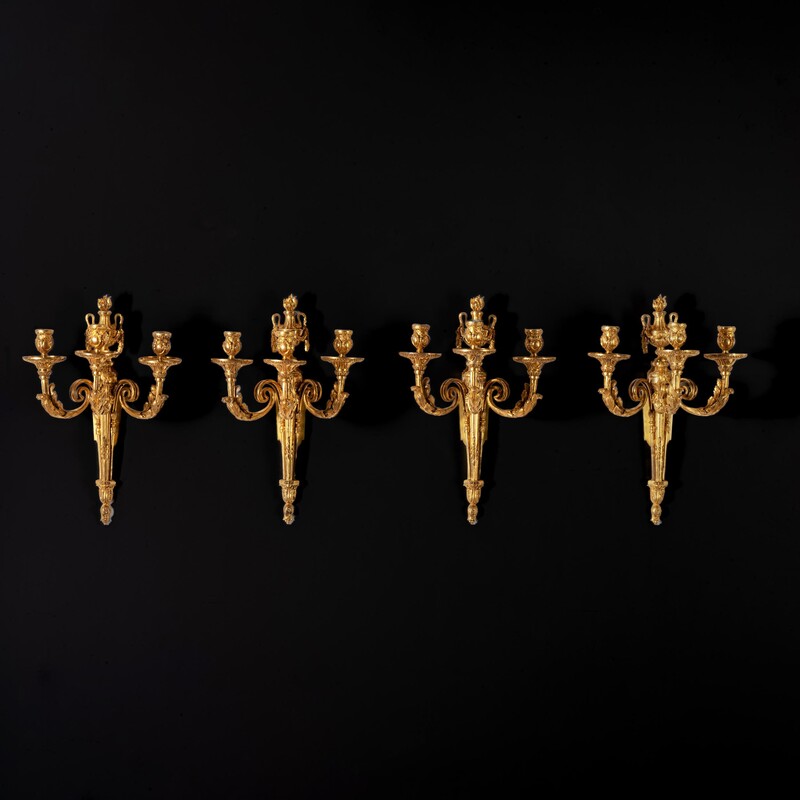 An Highly Important Set of Four Louis XV Ormolu Three-branch Wall-lights Circa 1770.