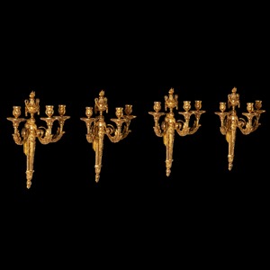 An Highly Important Set of Four Louis XV Ormolu Three-branch Wall-lights Circa 1770