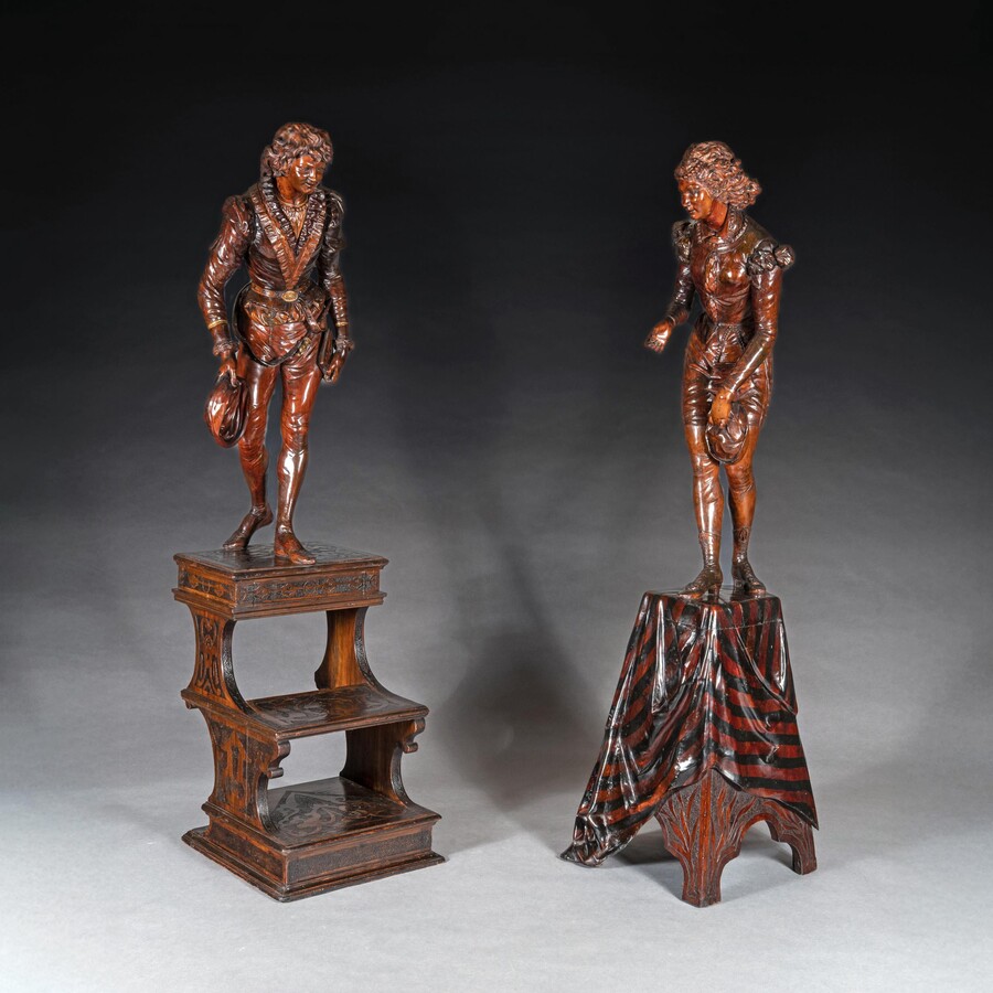 A Fine and Imposing Pair of Large-Scale Carved Walnut Venetian Figures in Elaborate Costume by Valentino Besarel (1829-1902)  Provenance  By repute the collection of Harvey c. Wheeler, owner of the Initial Towel Supply Company in Boston, who died in 1947